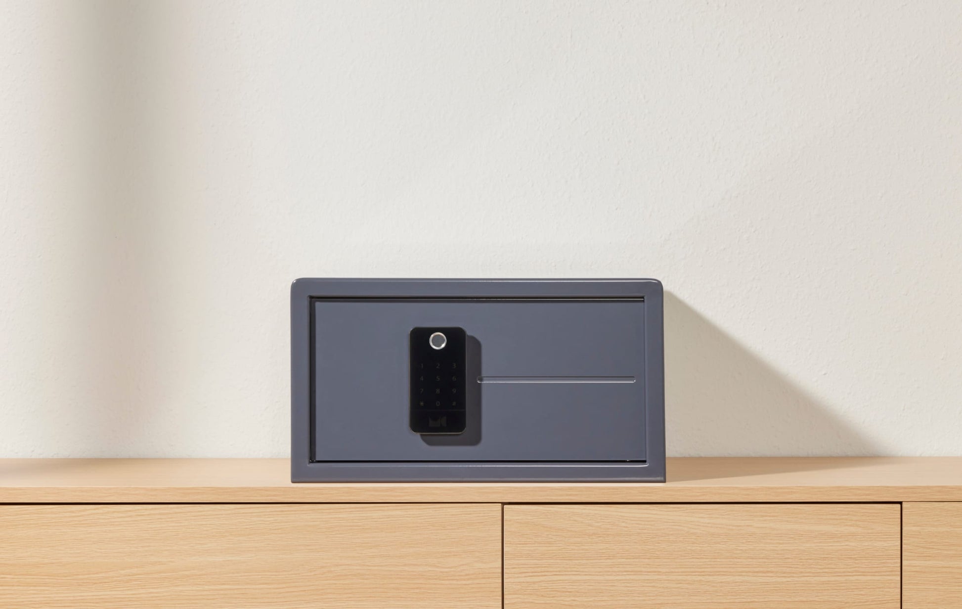 A graphite grey Biocube Mini sitting at a straight angle